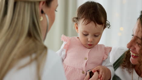 baby, pediatrician and mom at doctor