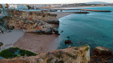 aerial view of stunning coastal cliffs and sandy beach in portugal