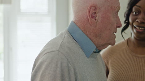 elderly man with caregiver