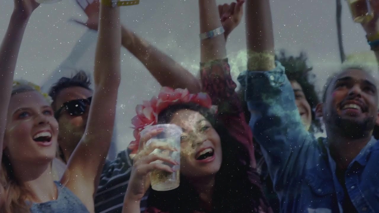 Group of festival-goers raising cups and cheering, music drop sparking nebula overlay intensifying