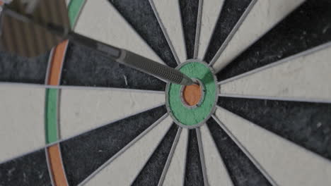 Darts-hitting-a-dart-board