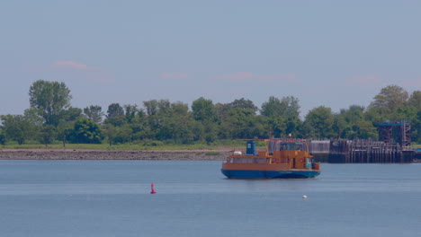 Roll-on,-roll-off-orange-ferry-heading-to-Hart-Island