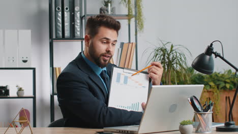 businessman working on laptop at office talk on online communication video call with employee boss