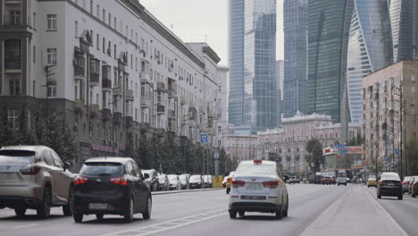 city street scene with skyscrapers and traffic