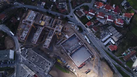 building construction with cranes aerial view