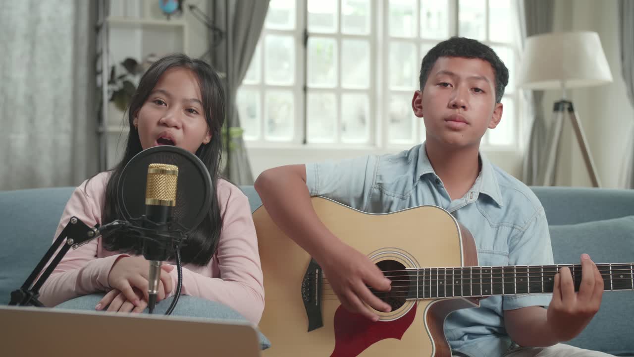 Children Singing and Playing Guitar