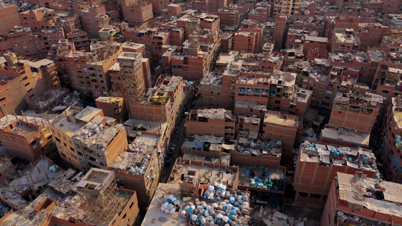 Cityscape of Garbage City with mountains of trash