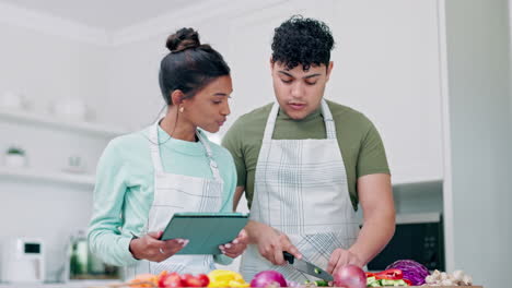 Cutting-vegetables,-tablet