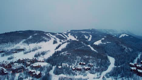 drone aerial view of telluride ski resort on a foggy winter afternoon