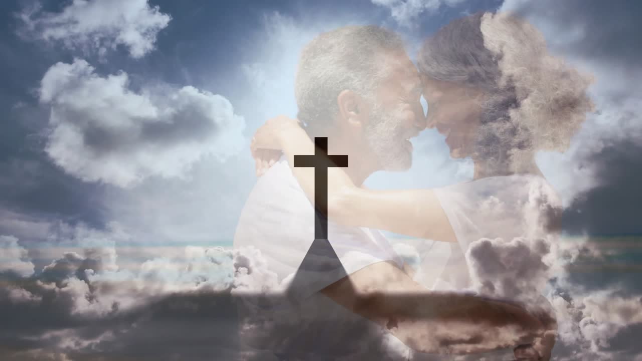 Senior couple embracing seaside, overlay deepening and cross silhouette honoring memory for health