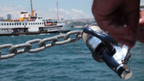 young fisher man fishing bosphorus istanbul 4