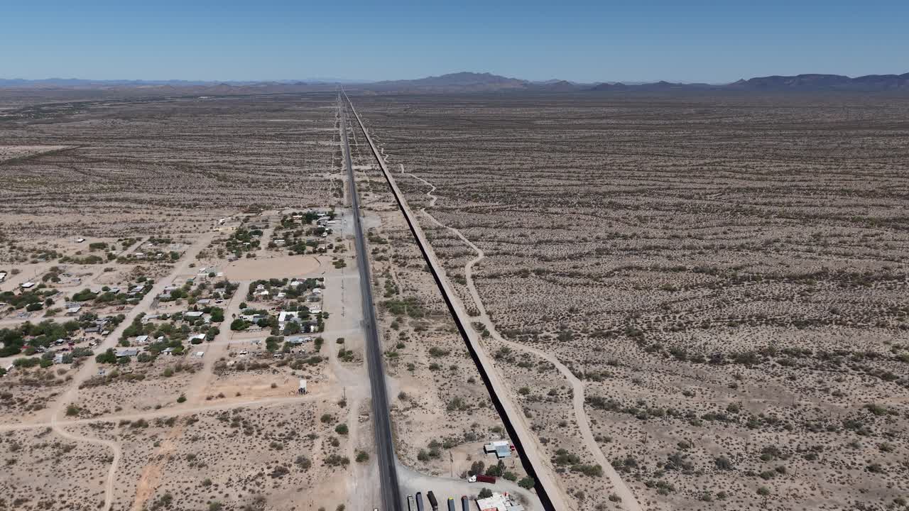 Aerial view of the border wall between Mexico and the United States, located in Sonoyta, Sonora on the Mexican side and Arizona on the US side.