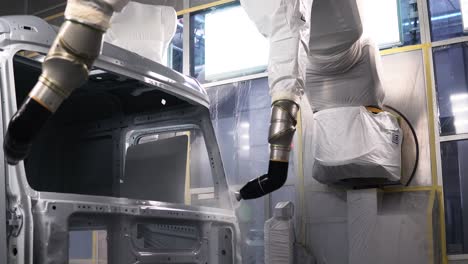 automated truck painting process in a factory