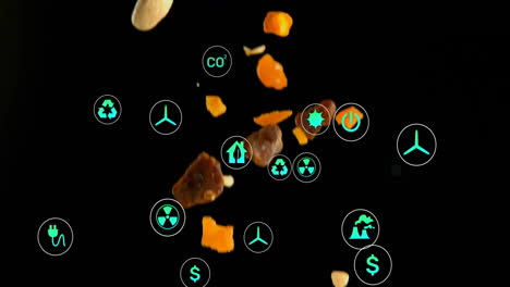 animating energy and environmental icons over falling food pieces on black background