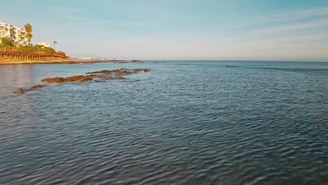 drone flying over the coast of calahonda, andalusia, spain