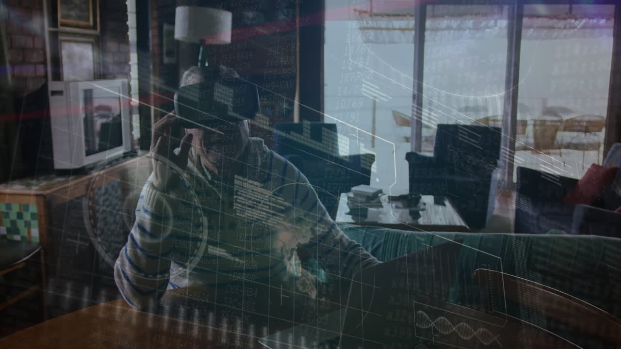 Talking on phone, man in home office with digital data animation overlay