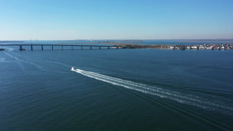 an aerial shot over grassy bay in queens, ny