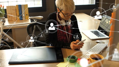 network of connections animation over woman using smartphone at office desk