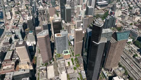 overhead drone shot of skyscrapers in downtown seattle featuring columbia tower