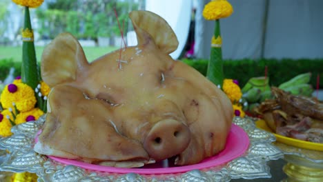 pigs head as the centrepiece of thai banquet