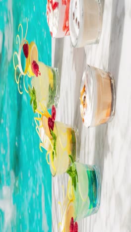 variety of refreshing drinks and cocktails by the pool