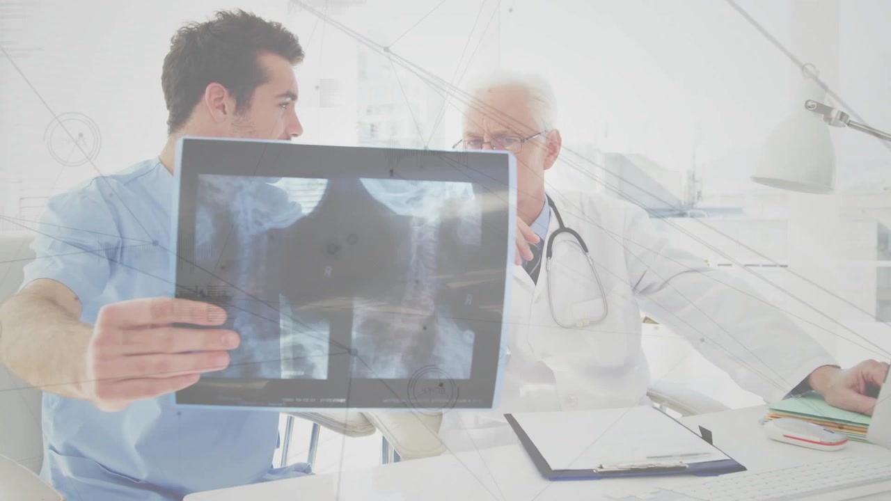 Junior medic holding X-ray and starting senior doctor studying, writing on clipboard for diagnosis