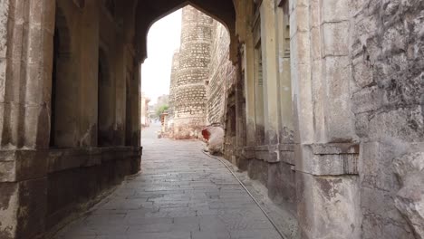 tracking shot walking through main archway of mehranarh fort at jodhpur, rajasthan, india