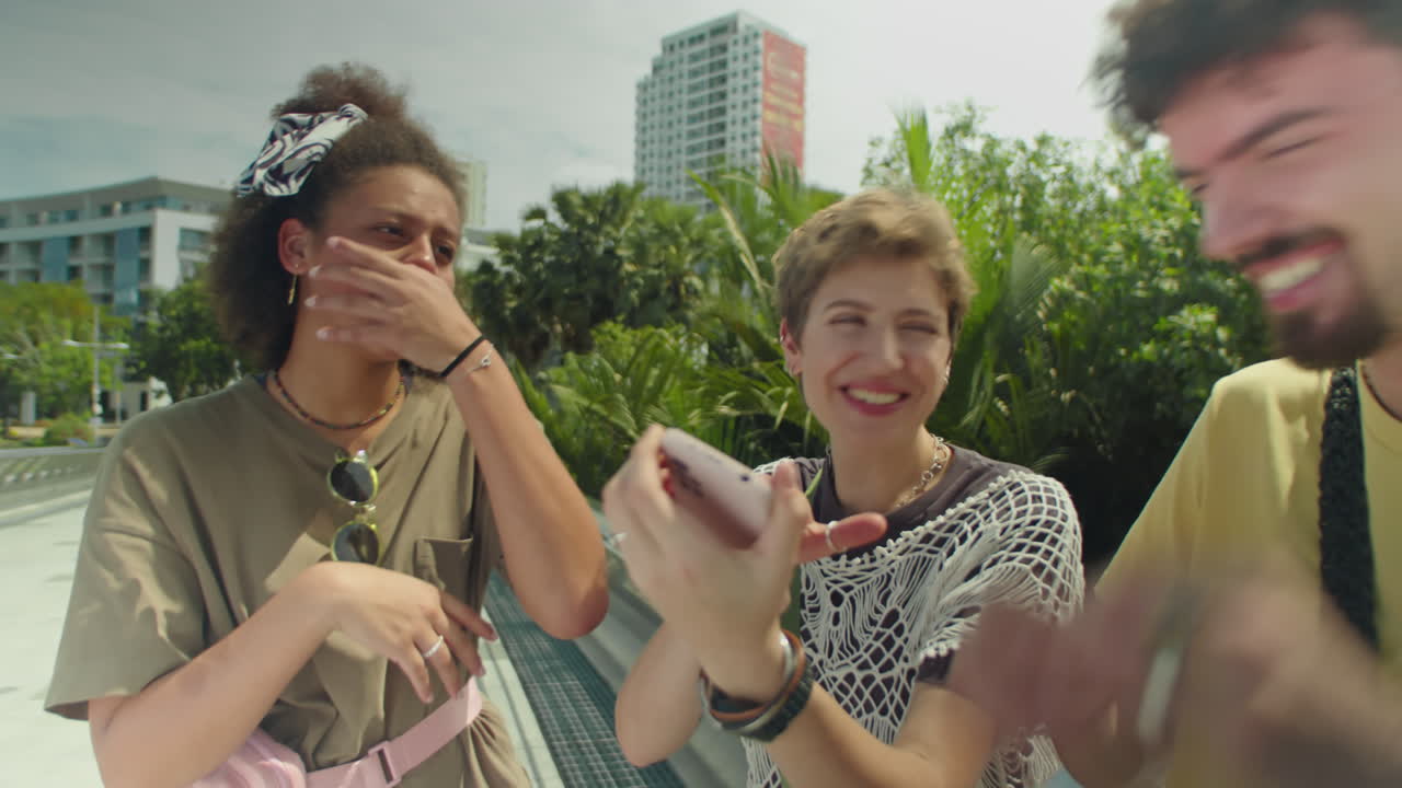 Joyous Friends Taking Selfie with Smartphone in City