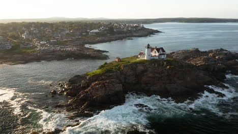 gorgeous sunset aerial footage of nubble lighthouse in cape neddick, maine