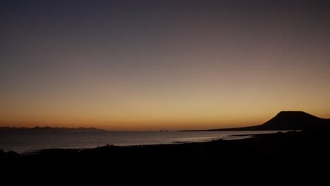 Nightfall over-The-Ocean-In-La-Graciosa,-Lanzarote