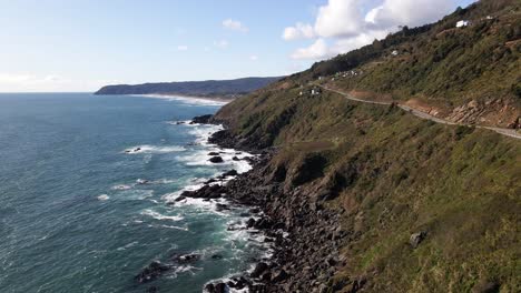 Aerial-push-out-view-of-cliffside-in-the-coastline-of-Chile