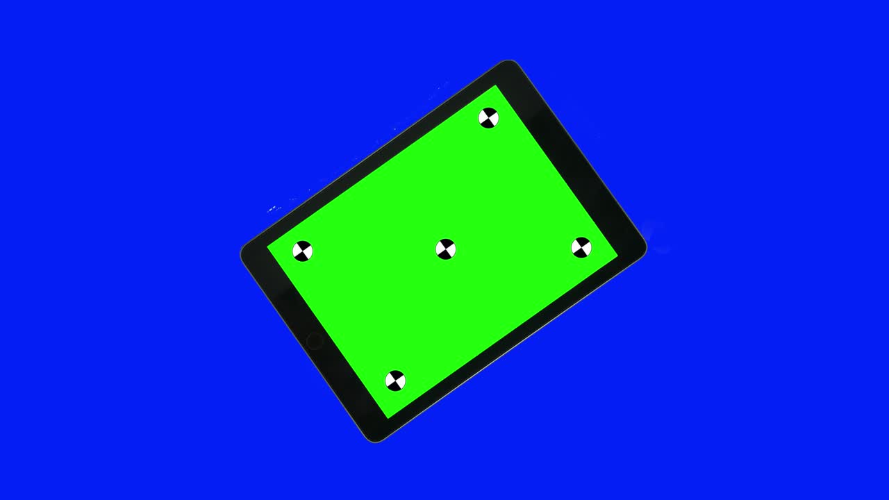 Green screen technology concept. Modern smart phone, tablet and computer mock up with green screen, alpha channel and tracking markers.