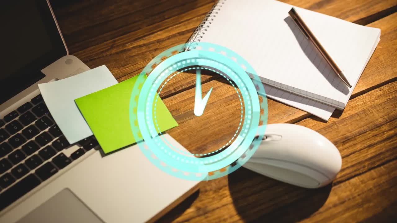 책상 위의 노트북 위의 시계의 애니메이션