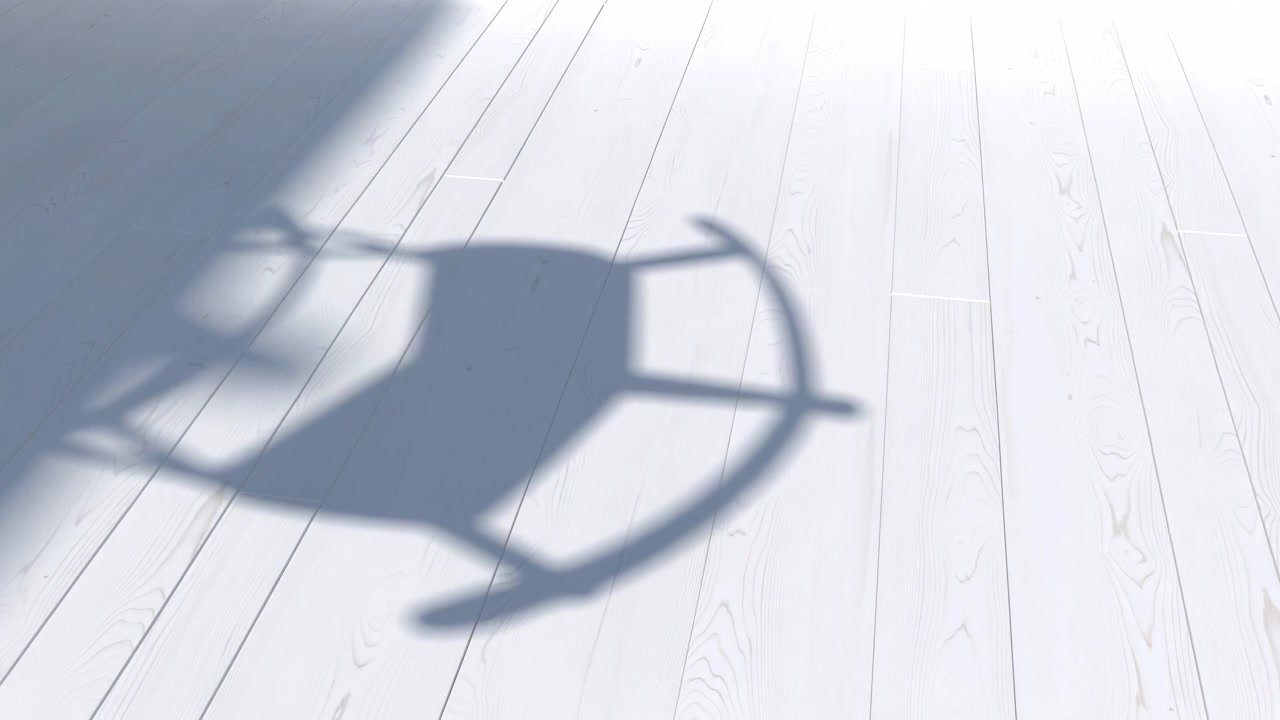 Curved shadow with crossbar shape drifts across pale wooden floorboards in strong angled sunlight, growing larger and more defined while subtle turning, soft falloff, and visible grain build quiet