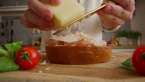 preparing a gourmet italian sandwich