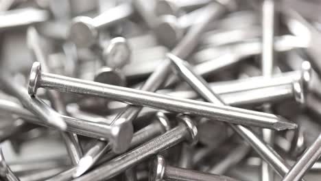 industrial steel nails. pile of nails background