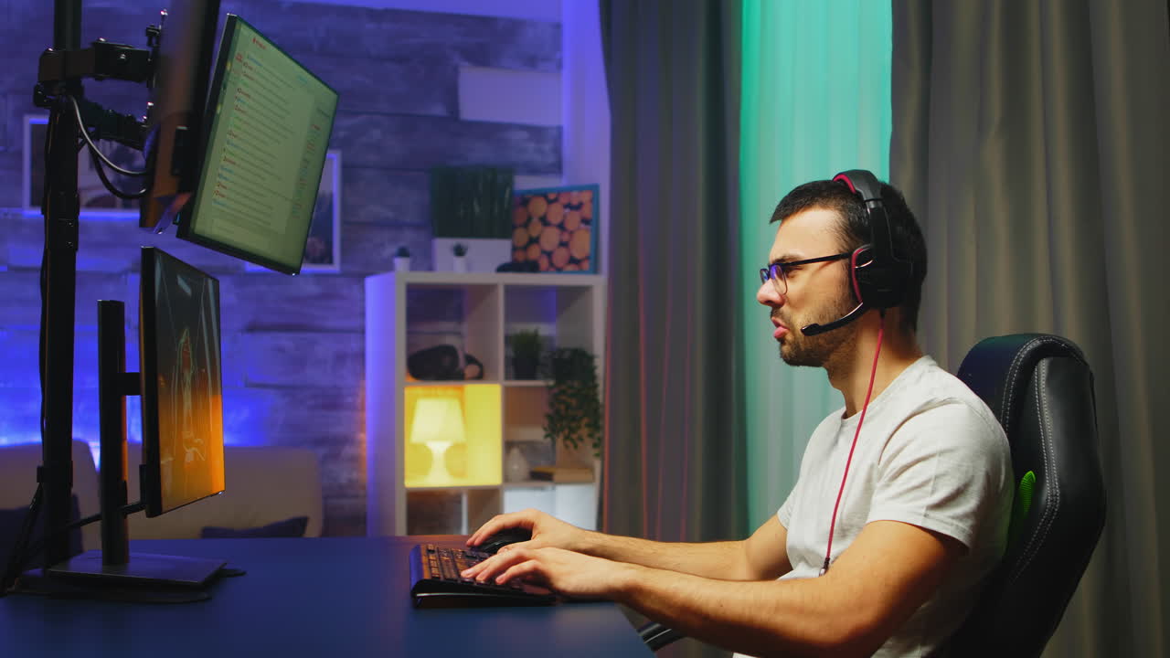 Professional young gamer playing shooter games