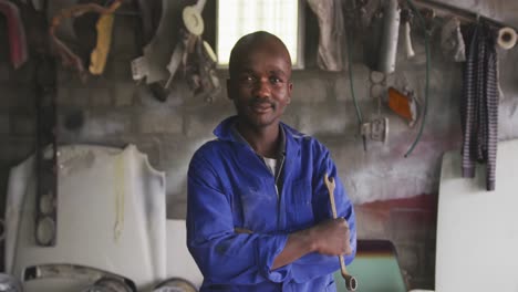 african man with tool in his hand