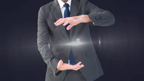 animation of glowing spot of light between businessman hands on grey background