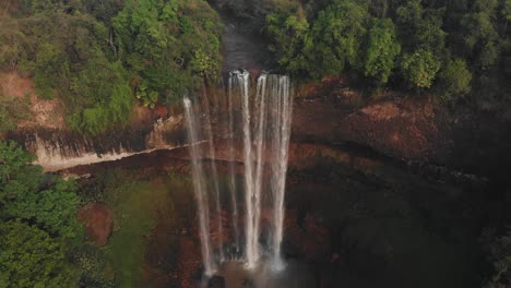 wide shot of tad jarou halang waterfall at laos bolaven plateau, aerial