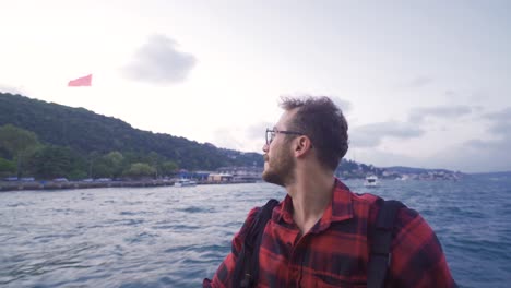 the man traveling on the ferry.