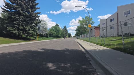 Driving-in-a-Residential-Area-in-a-sunny-day-with-clouds