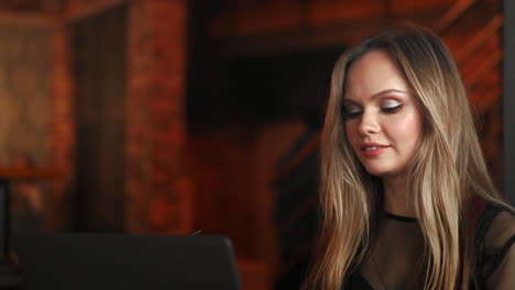 Cropped-shot-view-of-young-smart-female-student-learning-on-line-via-laptop-computer-before-her-lectures,-intelligent-woman-sitting-in-front-open-net-book-with-copy-space-screen-for-your-text-message