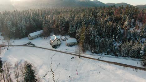 Drone-Shot-over-a-village-in-the-forest