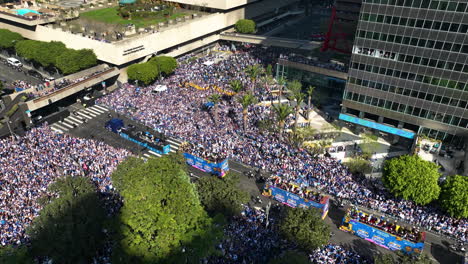 aerial view circling parade trucks at the dodgers world series celebration in la