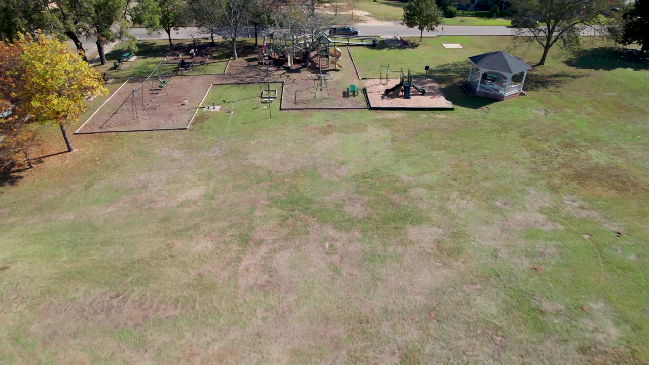 Aerial video of a playground in the Lion's Club Park in Jefferson, Texas