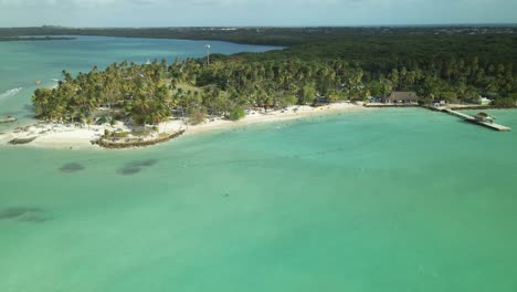 a narrow white sand peninsula on the southwestern tip of tobago, pigeon point heritage park