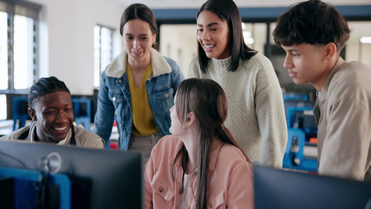 Group of students collaborating in a computer lab