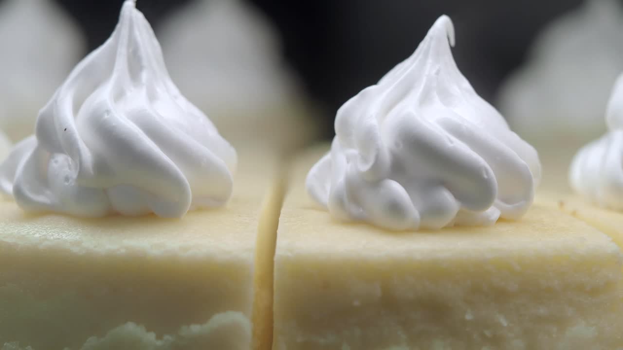 Close-up of Lemon Cakes with Whipped Cream Toppings