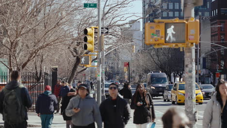 busy city street scene on a sunny day